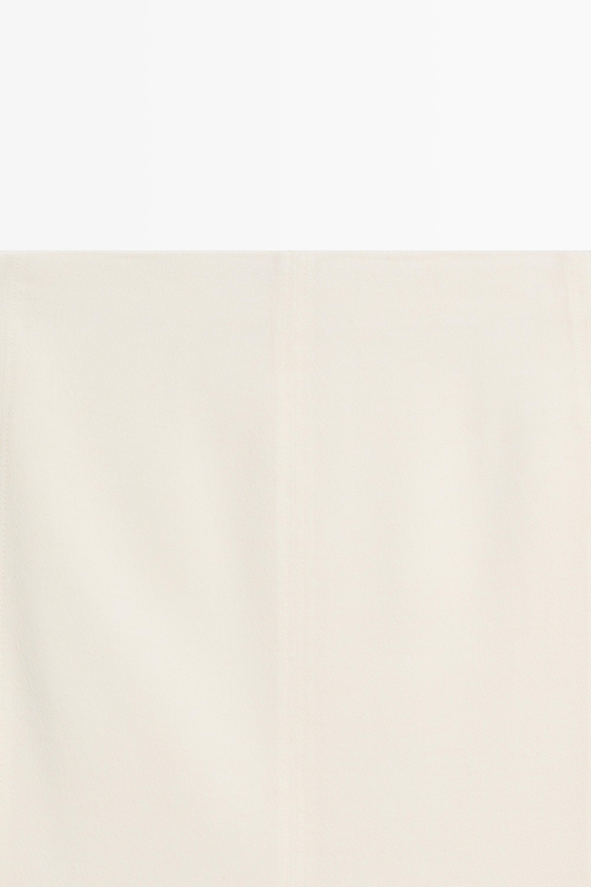 Double-layered midi skirt with seam detail